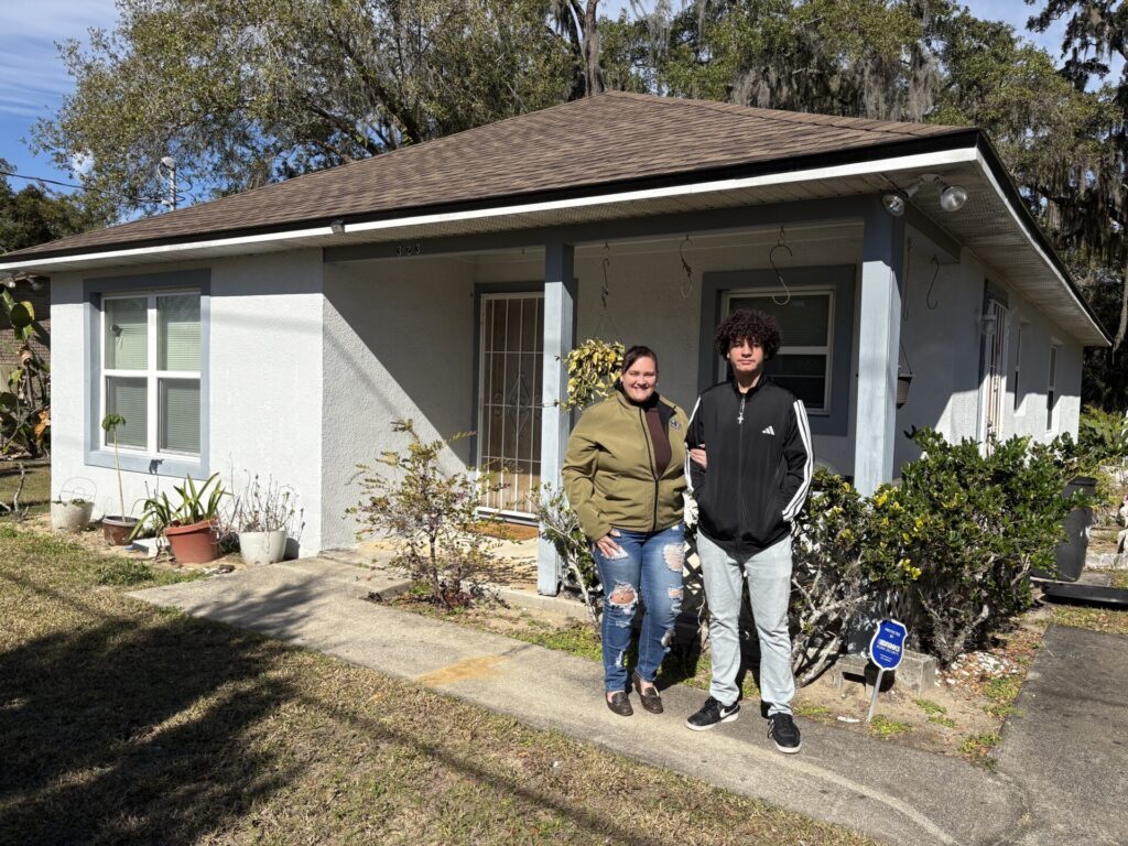 Priscilla in Front of Future Home (2)
